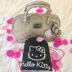 Hello kitty soft gold dome bag by Loungefly